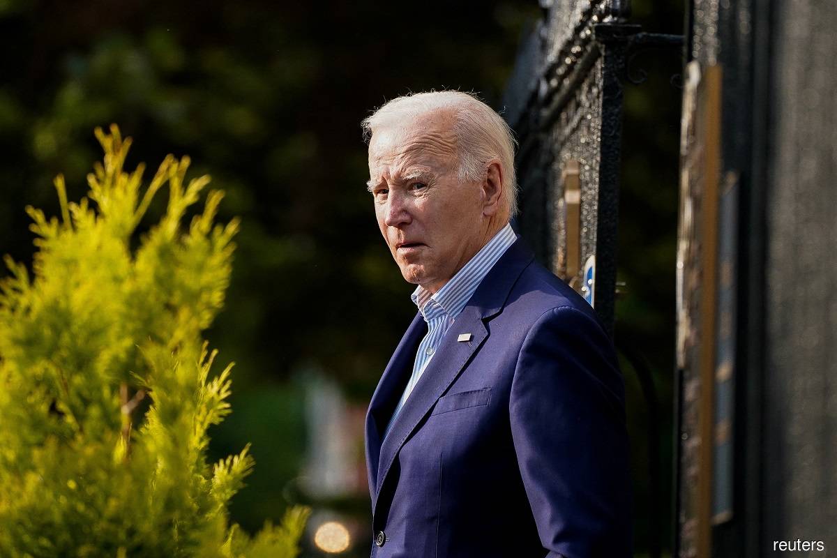 Biden signs debt limit bill, avoiding US default